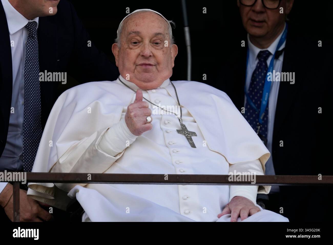Pope Francis thumbs up as he appears at a window of the Agostino ...
