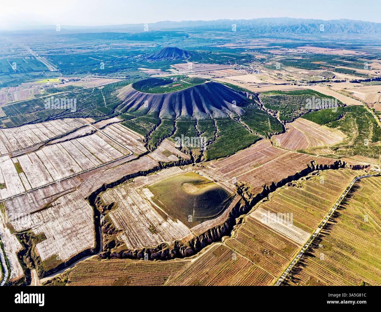 Aerial view of eroded extinct volcanoes in the volcano geologic park in ...
