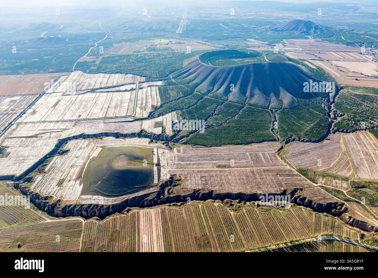 Aerial view of eroded extinct volcanoes in the volcano geologic park in ...