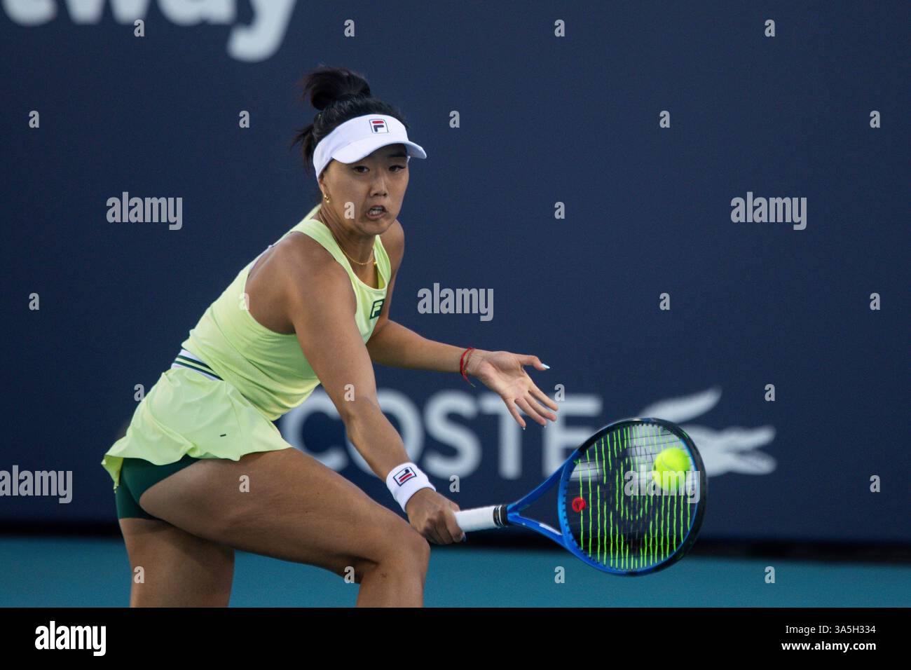 Ann Li of The United States returns the ball during the Miami Open ...