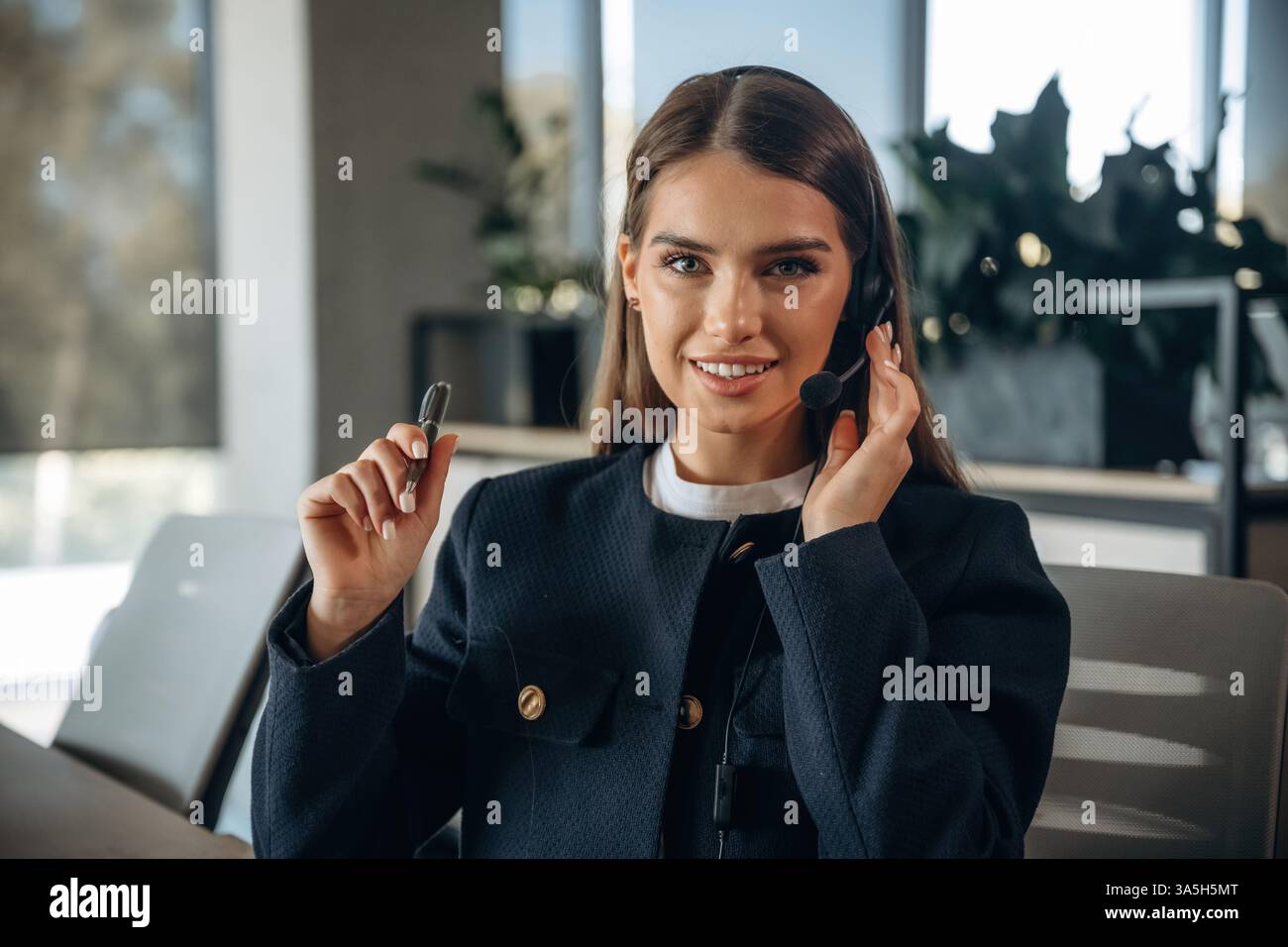 Woman is working in the office. Stock Photo