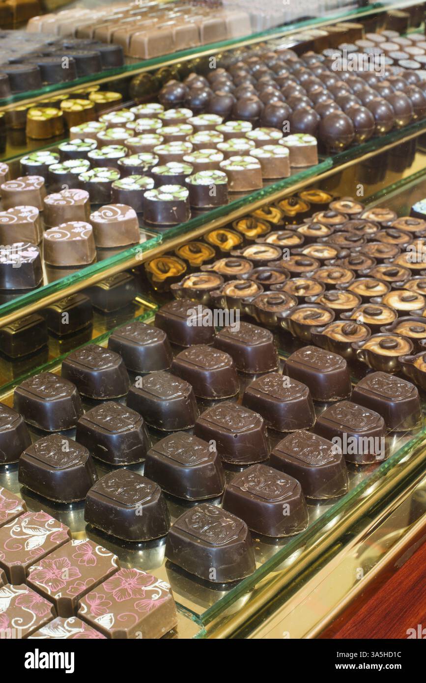Chocolate candy in a store window. Stand with chocolates. Bulgaria Stock Photo