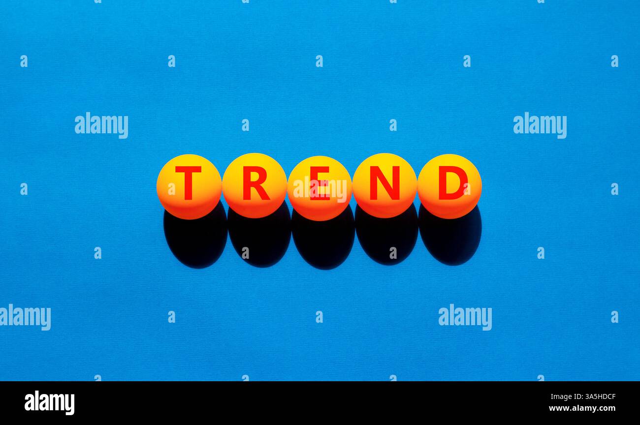 Trend and trending symbol. Concept word Trend on beautiful yellow ...
