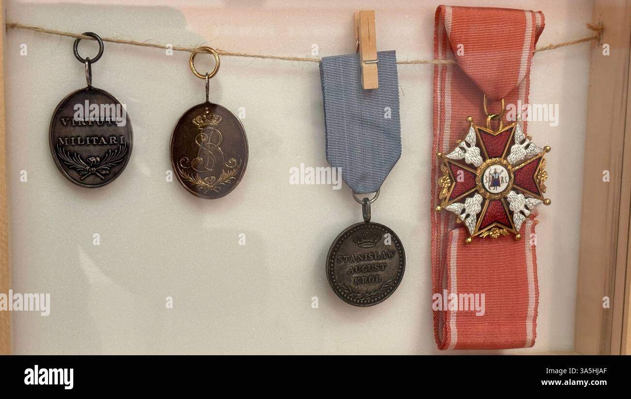 Vintage old World War Two medals and ribbons. Military equipment on display in a museum. - Smartphone Captured Stock Image
