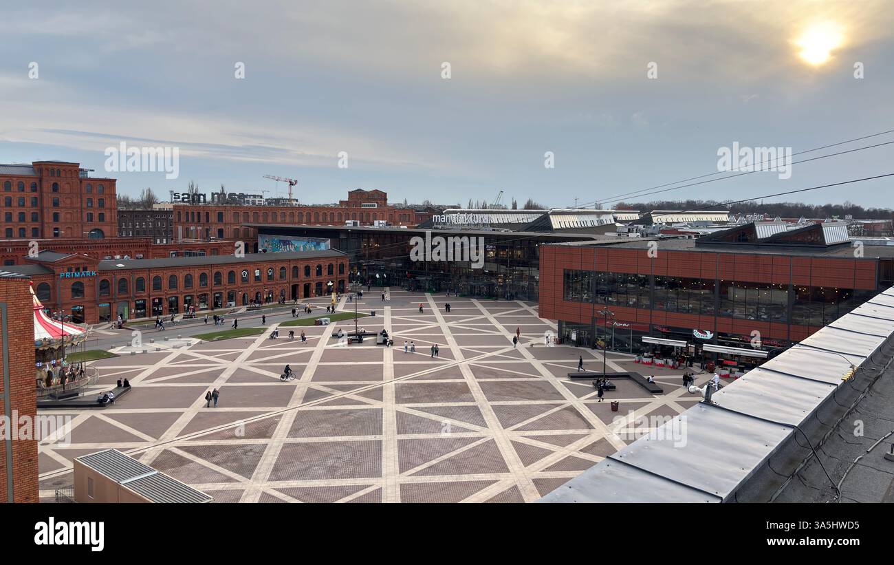 Red brick factory Manufaktura shopping centre Łódź, Poland. Polish factory buildings renovated in Lodz - Smartphone Captured Stock Image