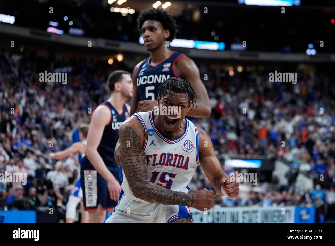 Florida guard Alijah Martin celebrates after scoring against UConn ...
