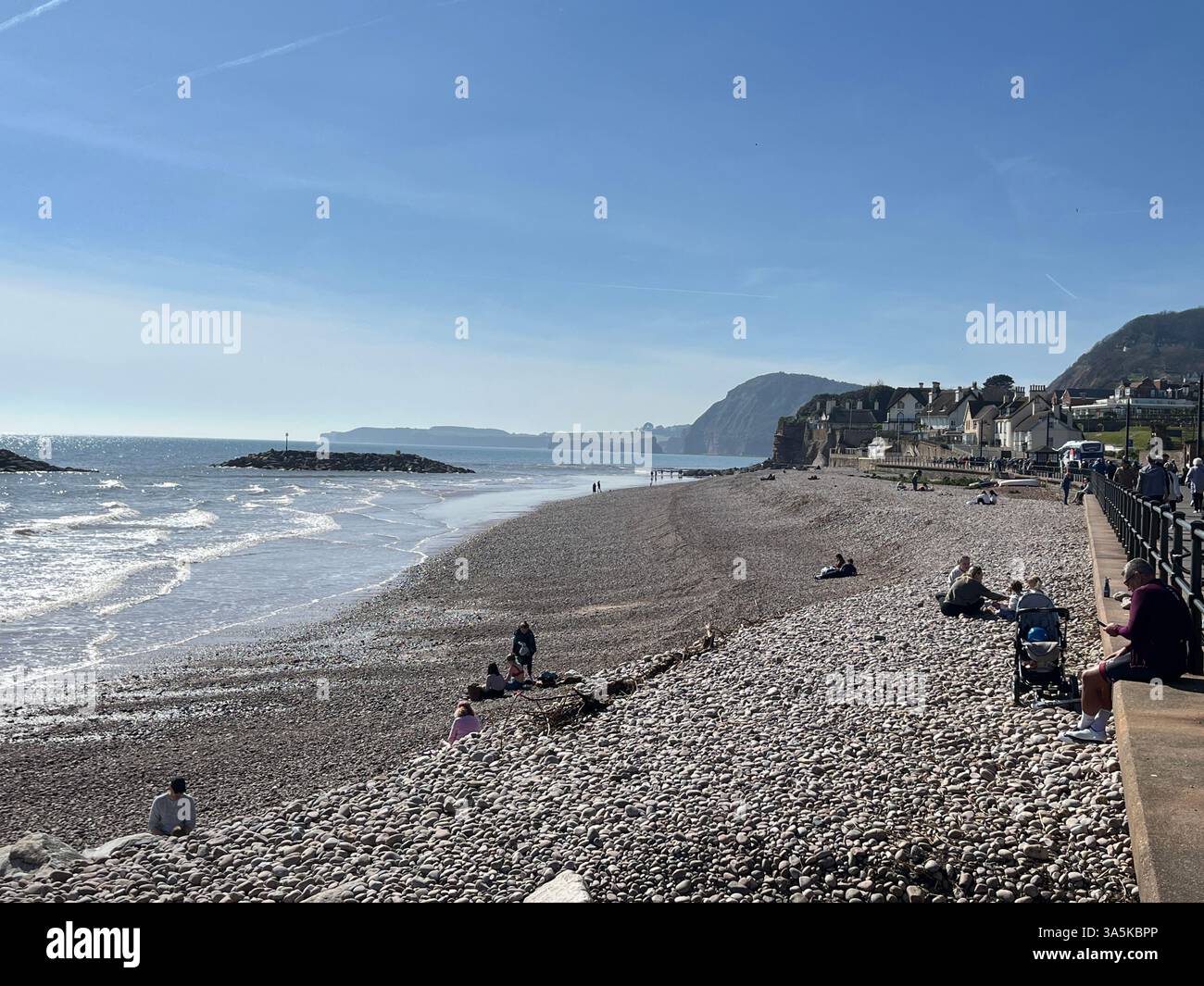 People on Sidmouth Beach in Devon - Smartphone Captured Stock Image