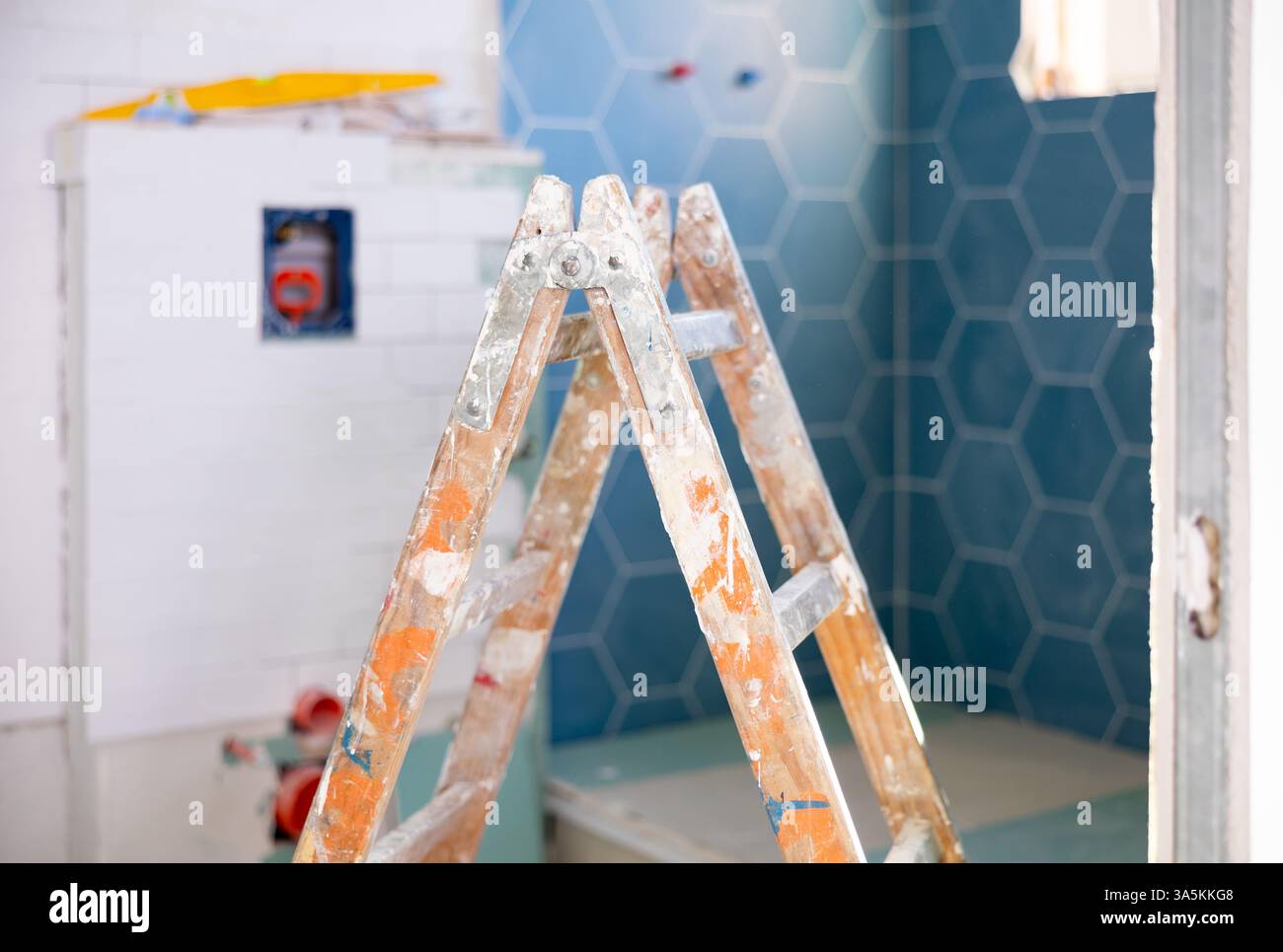 Stepladder in empty bathroom during improvement works Stock Photo
