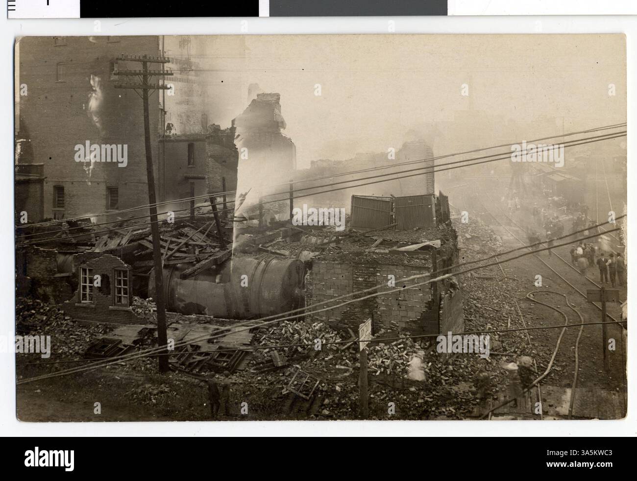 This image depicts the rubble of the Malt House building in Mankato ...