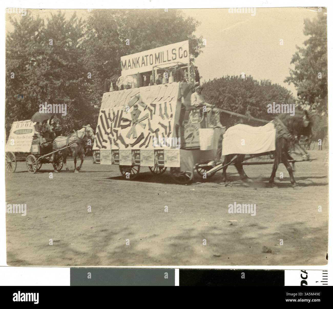 Featuring a horse drawn float with a display of stockings hi-res stock ...