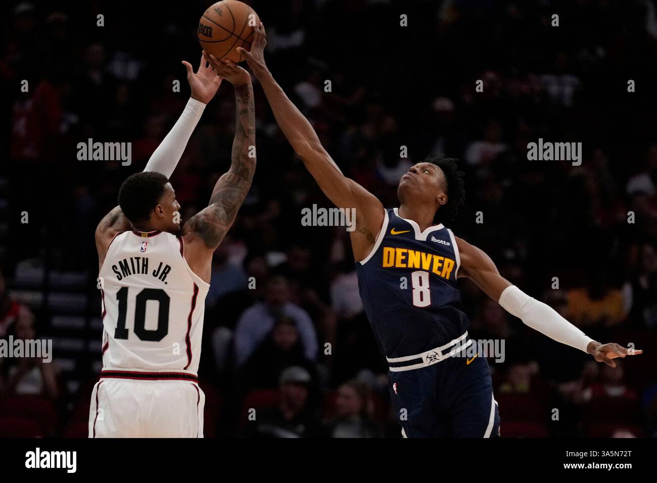 Denver Nuggets forward Peyton Watson (8) blocks a shot by Houston ...