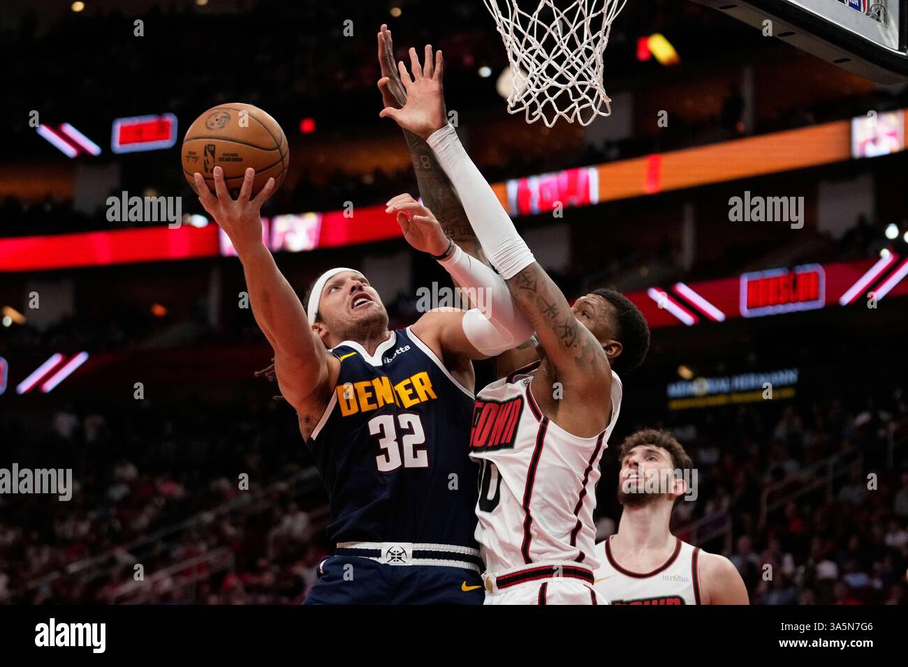 Denver Nuggets forward Aaron Gordon (32) shoots against Houston Rockets ...