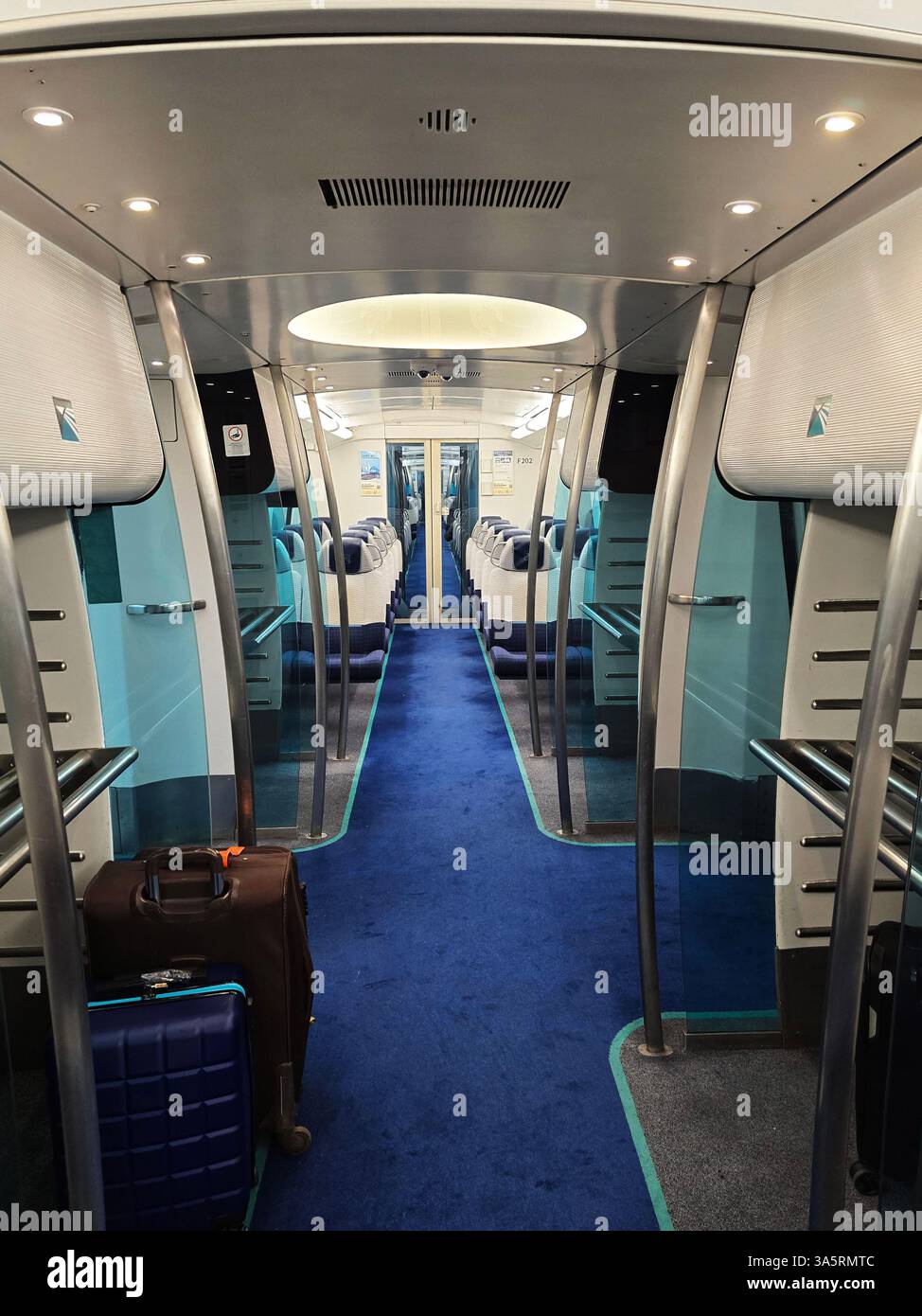 The modern Airport Express train connecting Hong Kong & Kowloon to the airport. - Smartphone Captured Stock Image