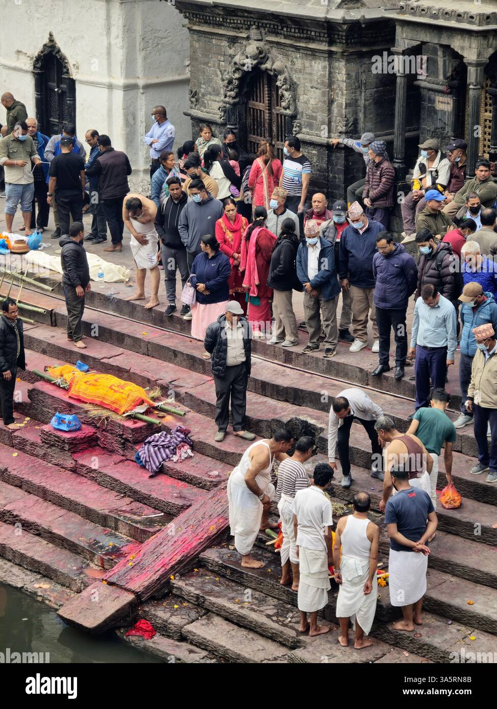 Cremation ceremony in Pahupatinath temple, Kathmandu, Nepal. - Smartphone Captured Stock Image