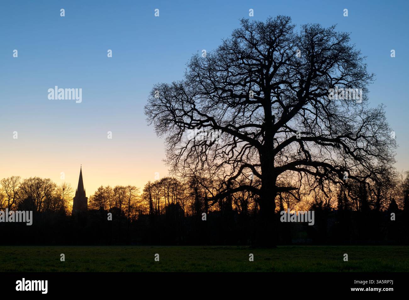 St Marys Church at dusk in Adderbury, Oxfordshire, England. Silhouette. Stock Photo