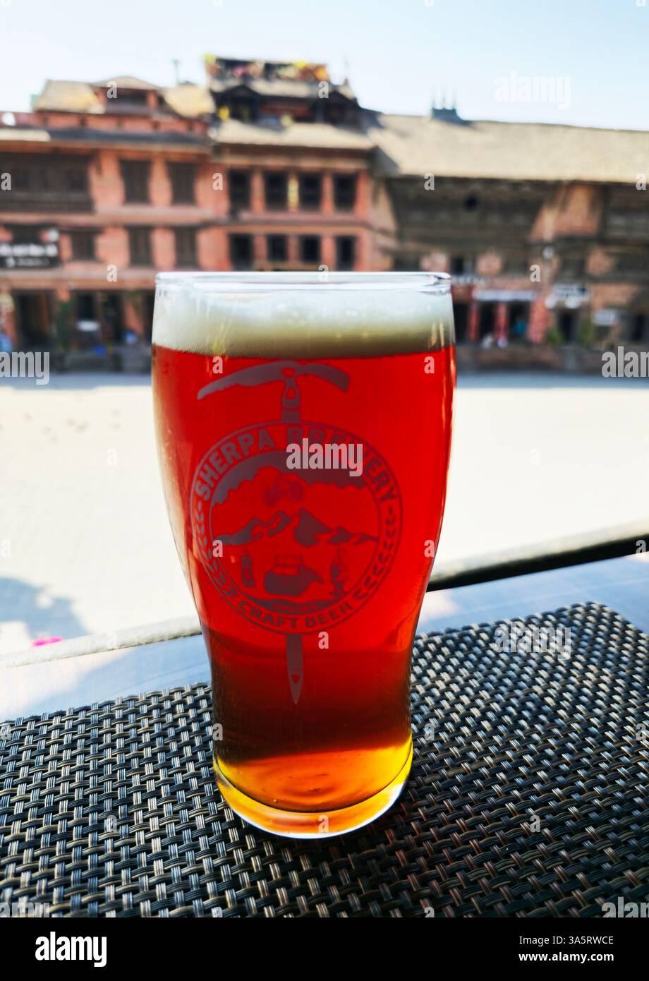 A pint of Sherba Amber Ale. Dattatraya square, Bhaktapur, Nepal. - Smartphone Captured Stock Image
