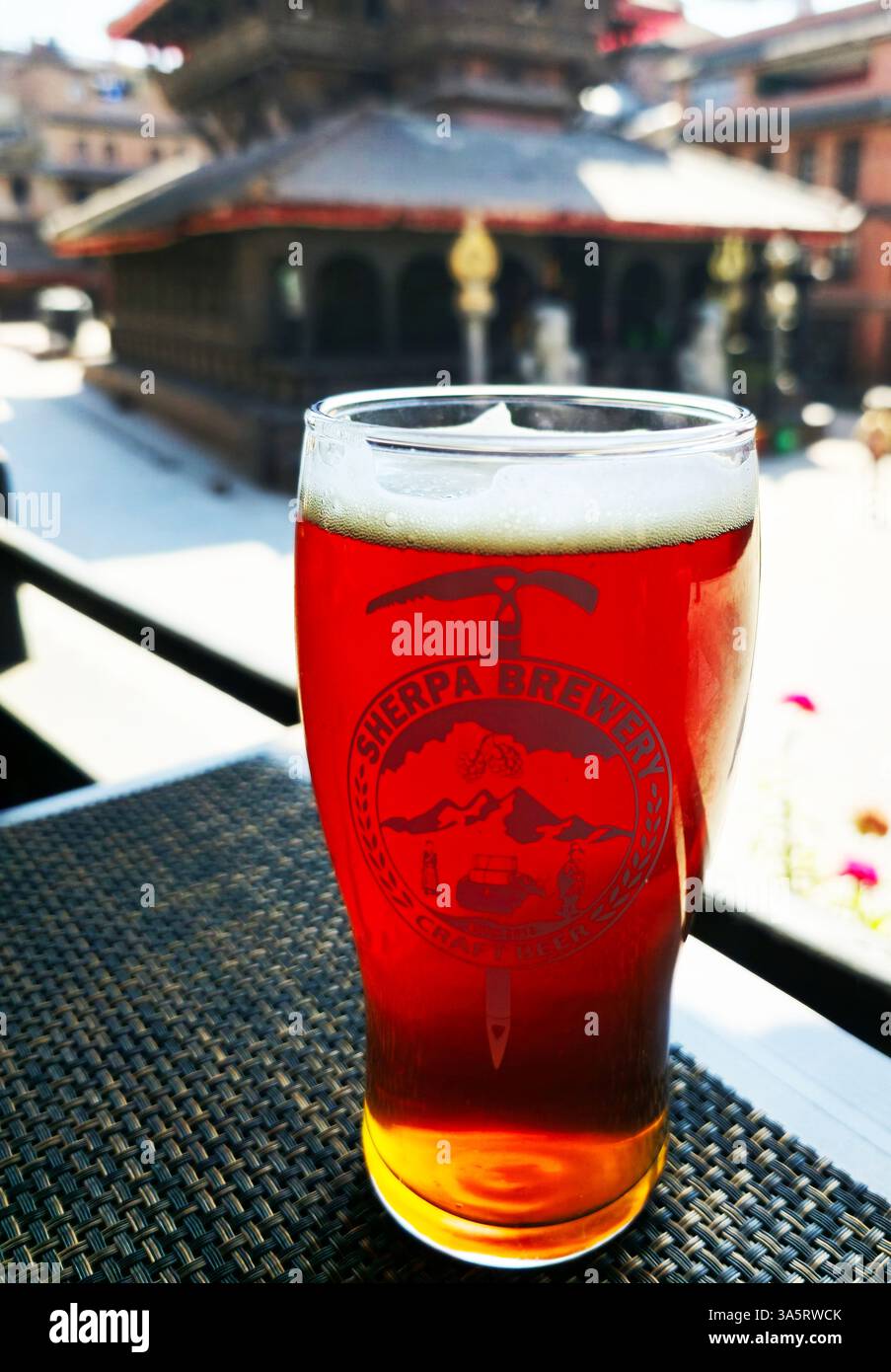 A pint of Sherba Amber Ale. Dattatraya square, Bhaktapur, Nepal. - Smartphone Captured Stock Image