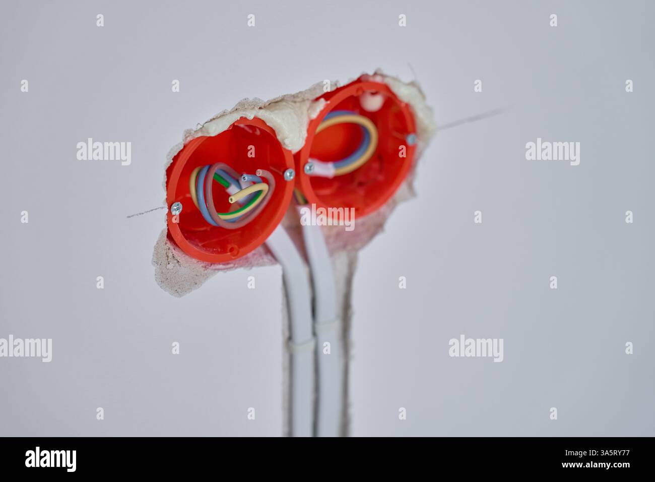 Electrical wiring installation during renovation. Plastic outlet boxes