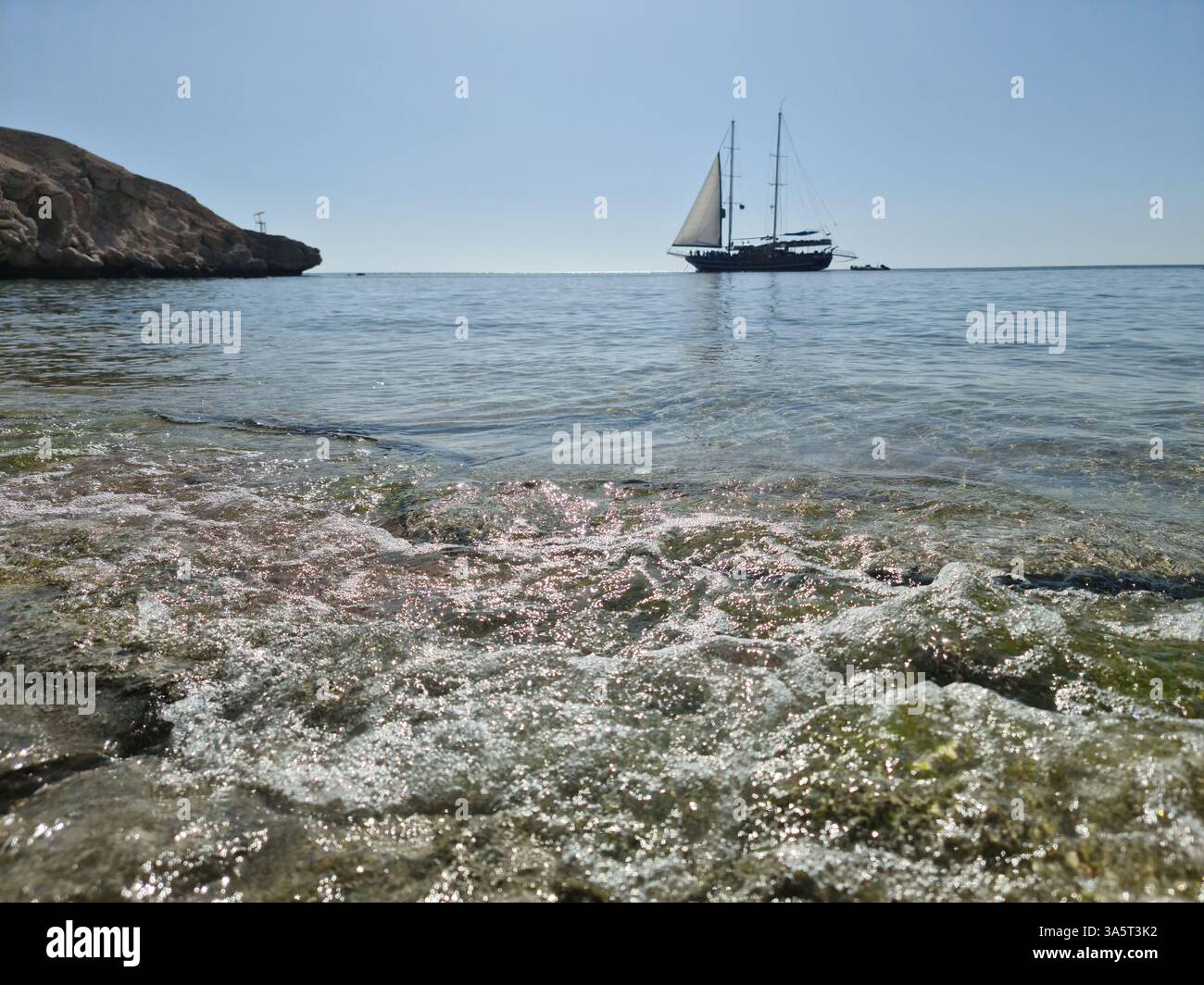 ship on the red sea coast Stock Photo - Alamy