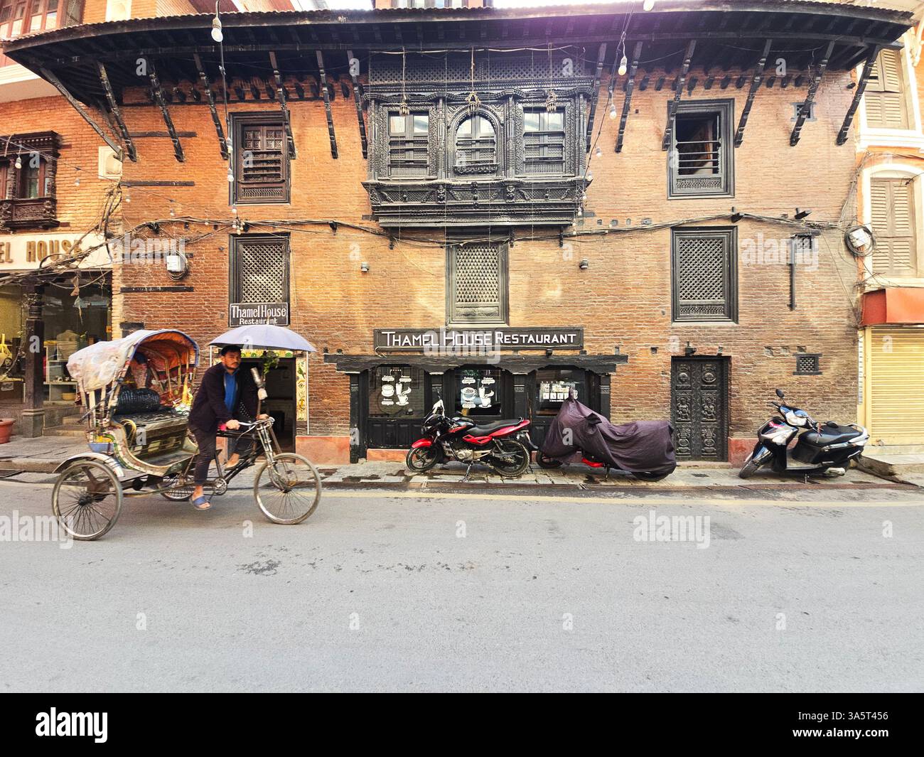 The Thamel House restaurant located in an old Newari house in the Thamel area of Kathmandu, Nepal. - Smartphone Captured Stock Image