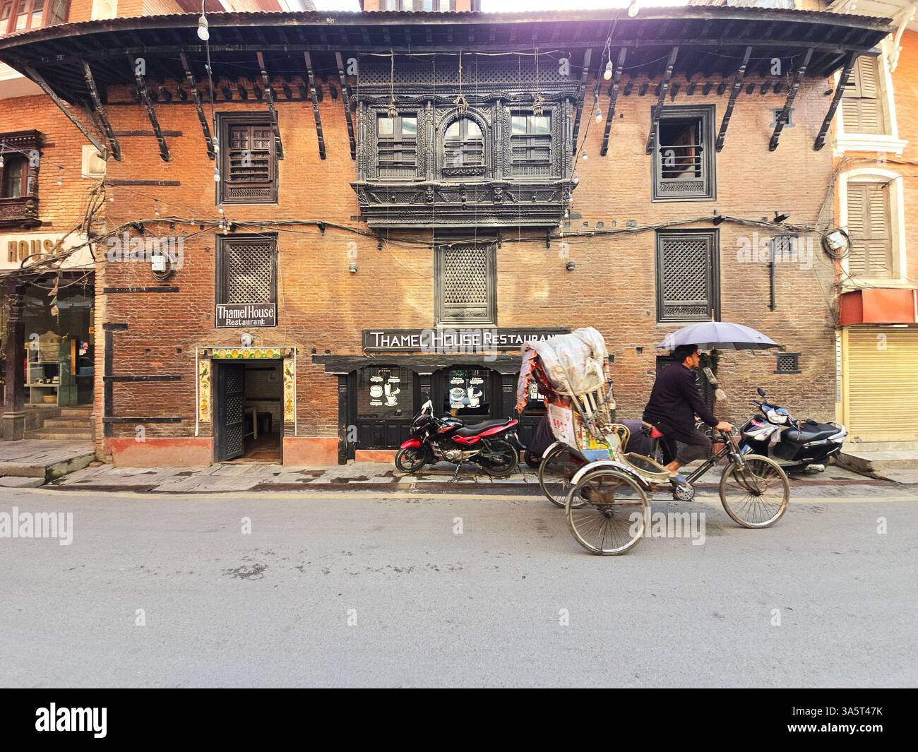 The Thamel House restaurant located in an old Newari house in the Thamel area of Kathmandu, Nepal. - Smartphone Captured Stock Image