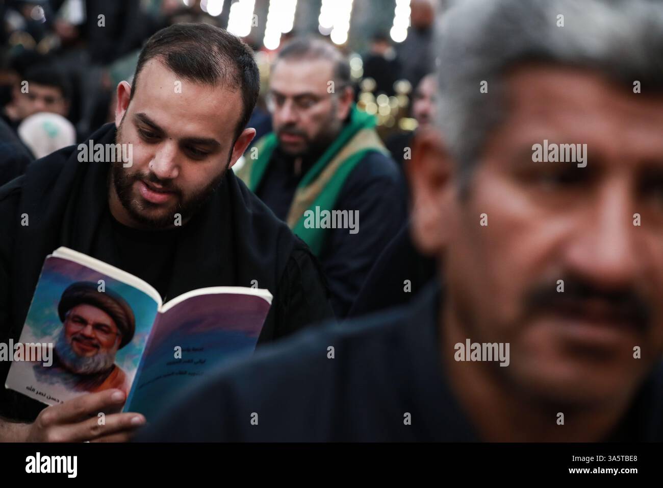 Karbala, Iraq. 23rd Mar, 2025. Iraqi Shiite Muslims gather at the Holy ...