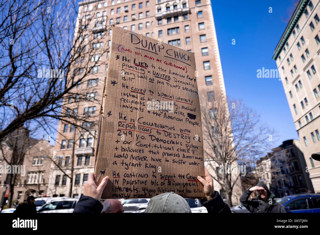 Hundreds rally outside of Senate Minority Leader Chuck Schumer's (D-NY) home. Protestors are calling for Schumer to resign after what they call 'a devastating lack of leadership' after he voted for a GOP-written funding patch to avert a government shutdown, claiming it was the better of two bad options.  (Photo by Michael Nigro/Pacific Press) Stock Photo