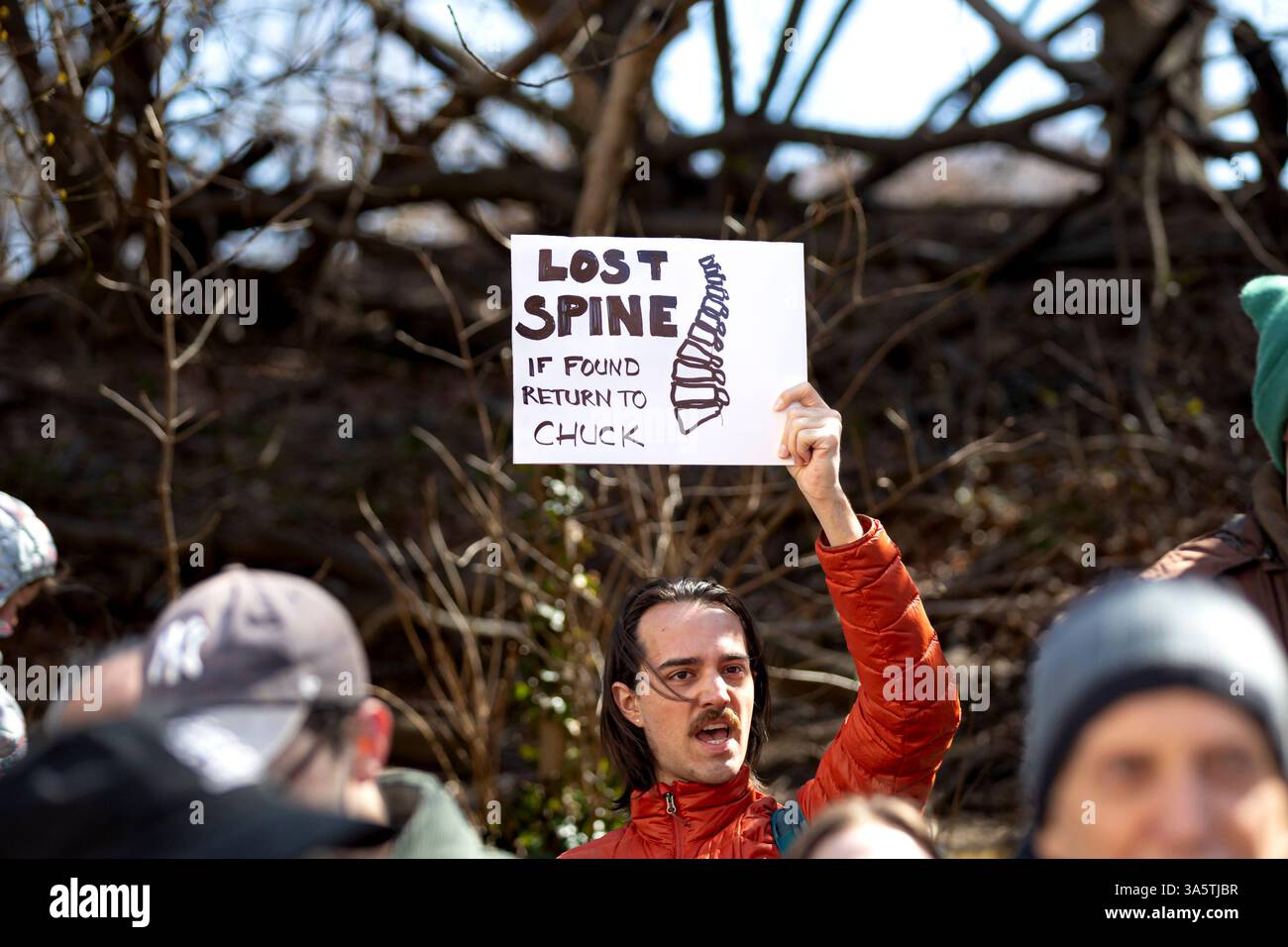 New York City, United States. 23rd Mar, 2025. Hundreds rally outside of Senate Minority Leader Chuck Schumer's (D-NY) home. Protestors are calling for Schumer to resign after what they call 'a devastating lack of leadership' after he voted for a GOP-written funding patch to avert a government shutdown, claiming it was the better of two bad options. (Photo by Michael Nigro/Pacific Press) Credit: Pacific Press Media Production Corp./Alamy Live News Stock Photo