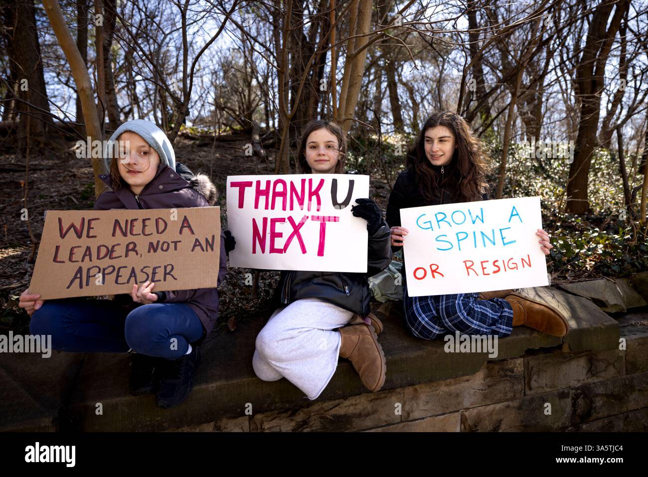 New York City, United States. 23rd Mar, 2025. Hundreds rally outside of Senate Minority Leader Chuck Schumer's (D-NY) home. Protestors are calling for Schumer to resign after what they call 'a devastating lack of leadership' after he voted for a GOP-written funding patch to avert a government shutdown, claiming it was the better of two bad options. (Photo by Michael Nigro/Pacific Press) Credit: Pacific Press Media Production Corp./Alamy Live News Stock Photo