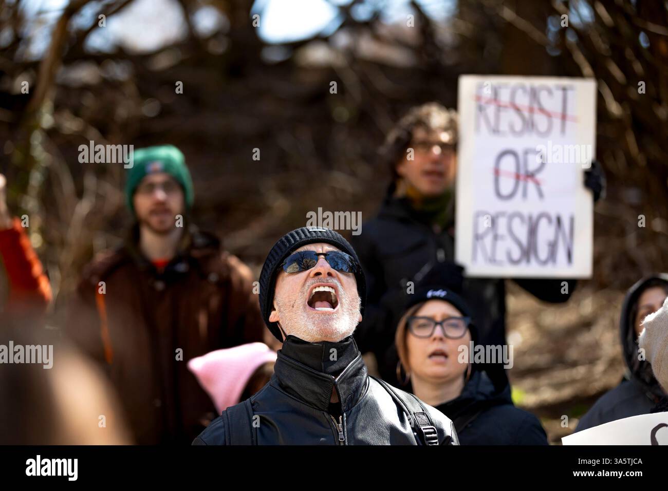 New York City, United States. 23rd Mar, 2025. Hundreds rally outside of Senate Minority Leader Chuck Schumer's (D-NY) home. Protestors are calling for Schumer to resign after what they call 'a devastating lack of leadership' after he voted for a GOP-written funding patch to avert a government shutdown, claiming it was the better of two bad options. (Photo by Michael Nigro/Pacific Press) Credit: Pacific Press Media Production Corp./Alamy Live News Stock Photo