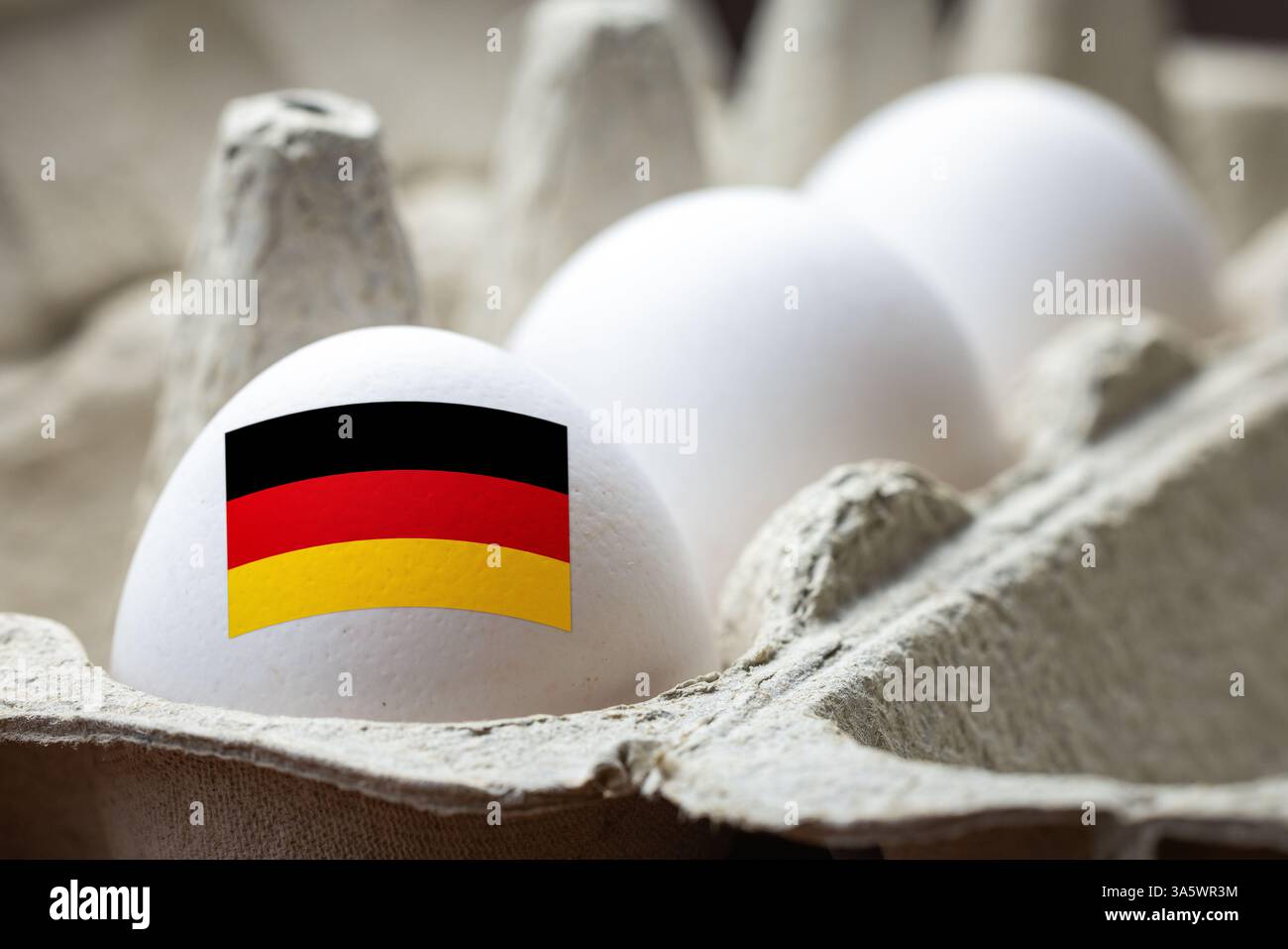 Egg with German flag in carton Stock Photo