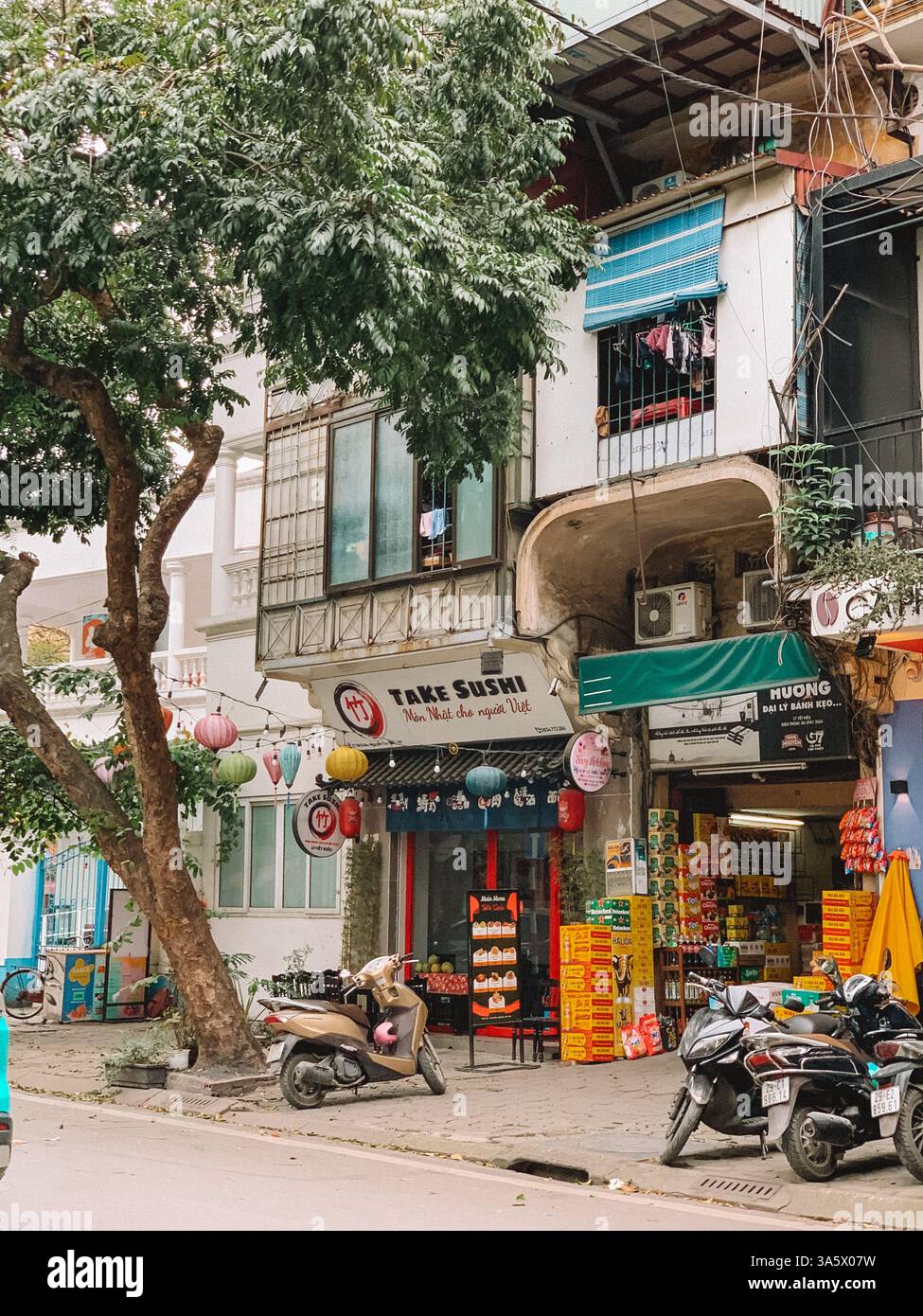 The Streets of Hanoi, Vietnam – A Lively Urban Scene Full of Culture - Smartphone Captured Stock Image