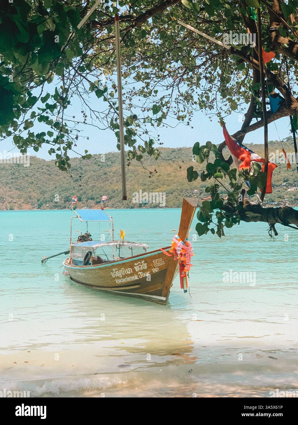Phi Phi Islands, Thailand – Scenic Tropical Paradise with a Boat on the Water - Smartphone Captured Stock Image