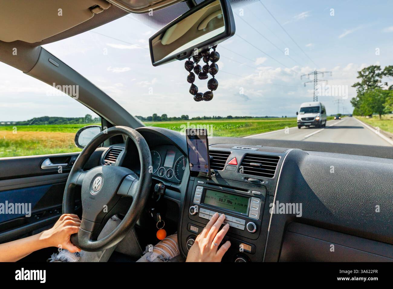 Using Waze maps application on smartphone on car dashboard Stock Photo ...