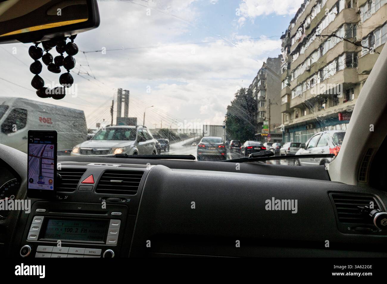 Using Waze maps application on smartphone on car dashboard Stock Photo ...