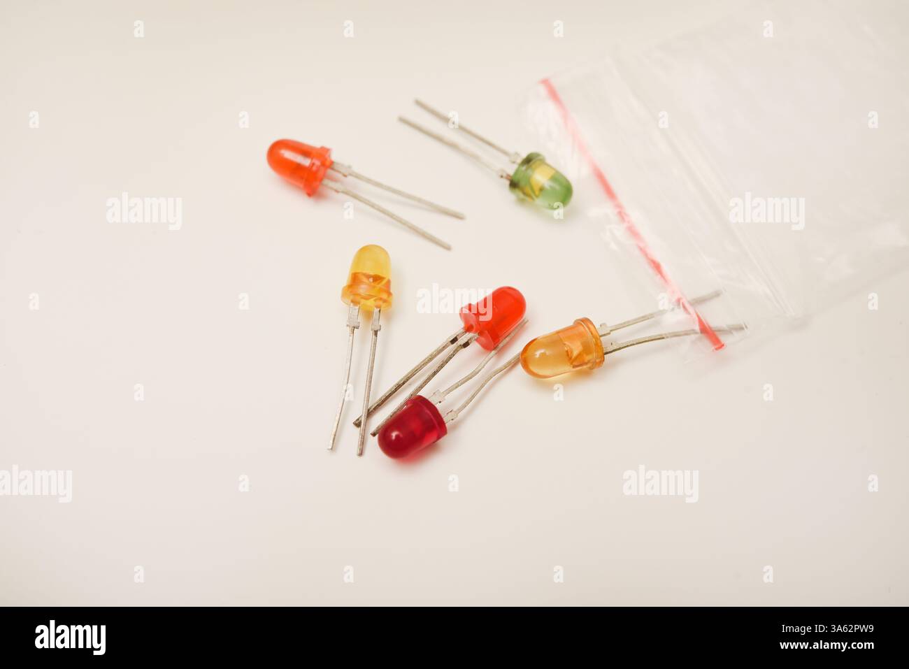 Multi-colored LEDs. Old LEDs on a white background. Stock Photo