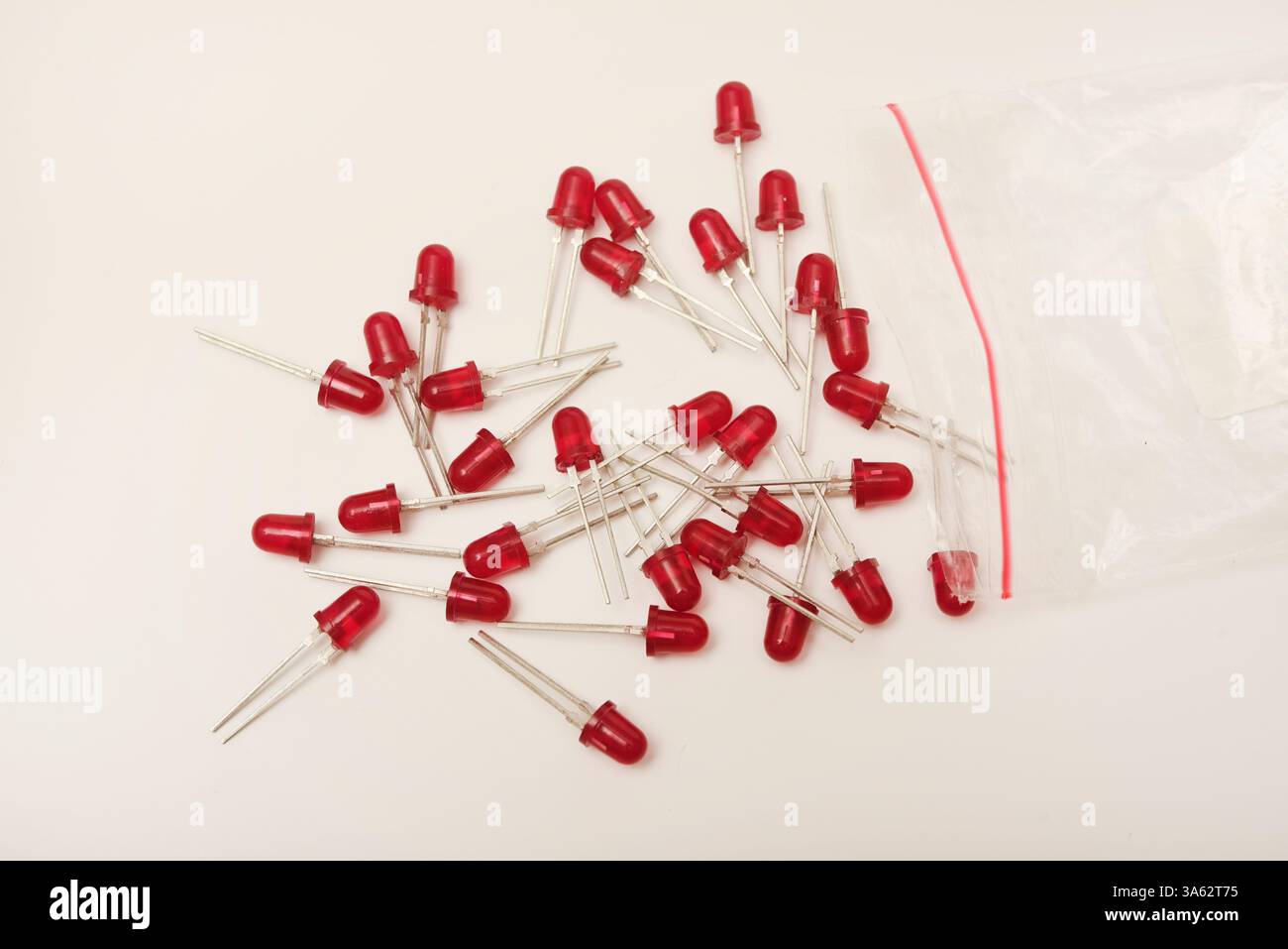 Red LEDs. The electronic component. Old LED elements. Stock Photo