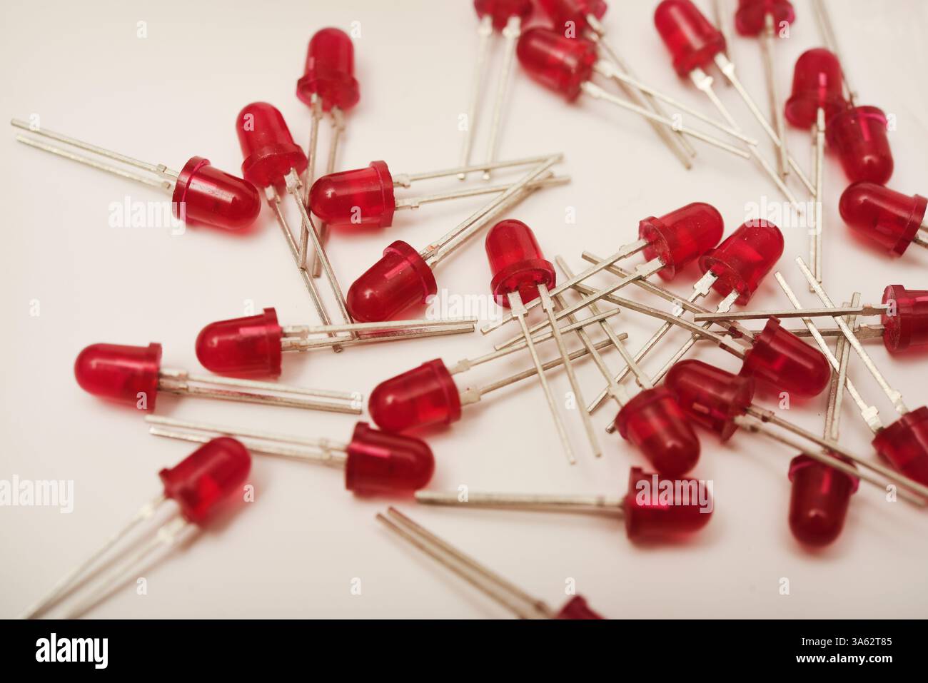 Red LEDs. The electronic component. Old LED elements. Stock Photo
