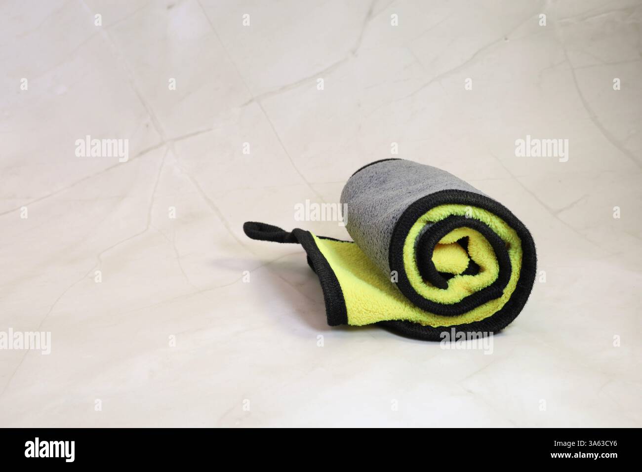 Rolled Yellow and Gray Microfiber Cloth Stock Photo