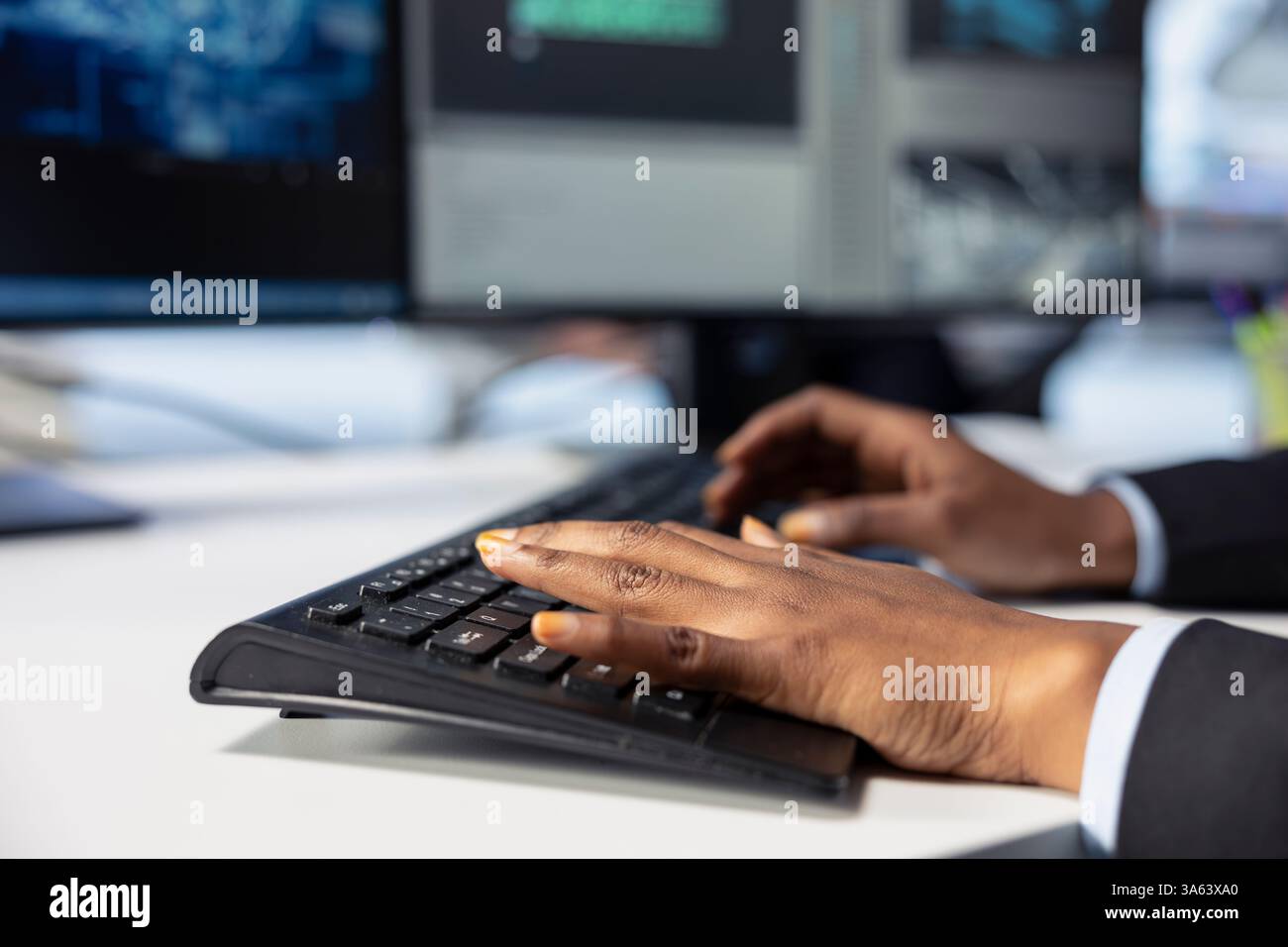 Photovoltaics factory engineer programming AI tools, typing on keyboard, developing solutions to detect errors. Close up of expert writing code, using machine learning to prevent equipment failures Stock Photo