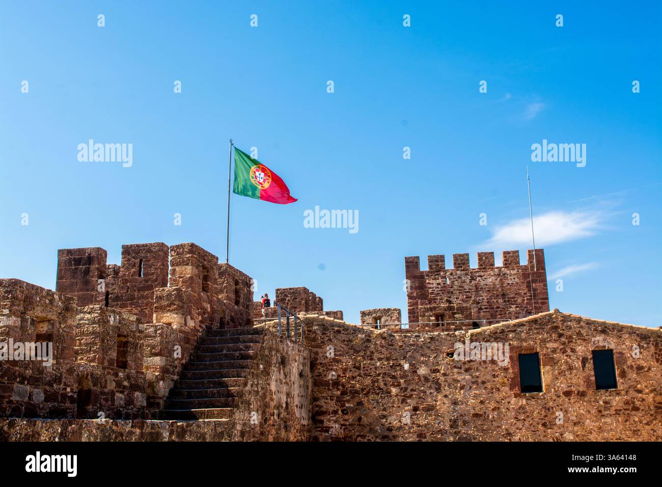 Silves flag at the Castelo de Silves, SIlves, Algrave, Portugal. Stock Photo