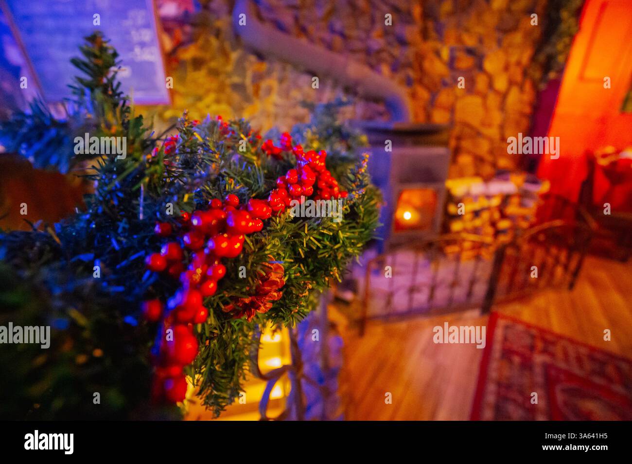Beautiful decor by the fireplace. Warm interior decor Stock Photo