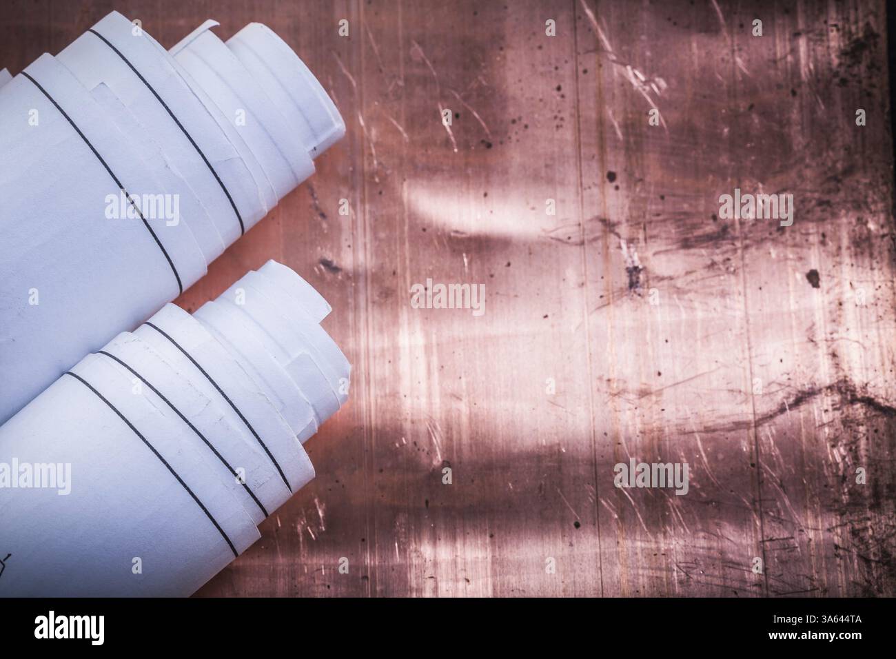 Blueprints on coppery background construction concept Stock Photo