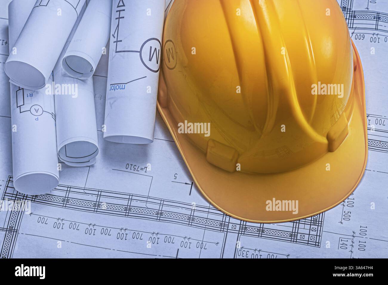 An Yellow Construction Helmet On Background Of Blueprints Stock Photo ...