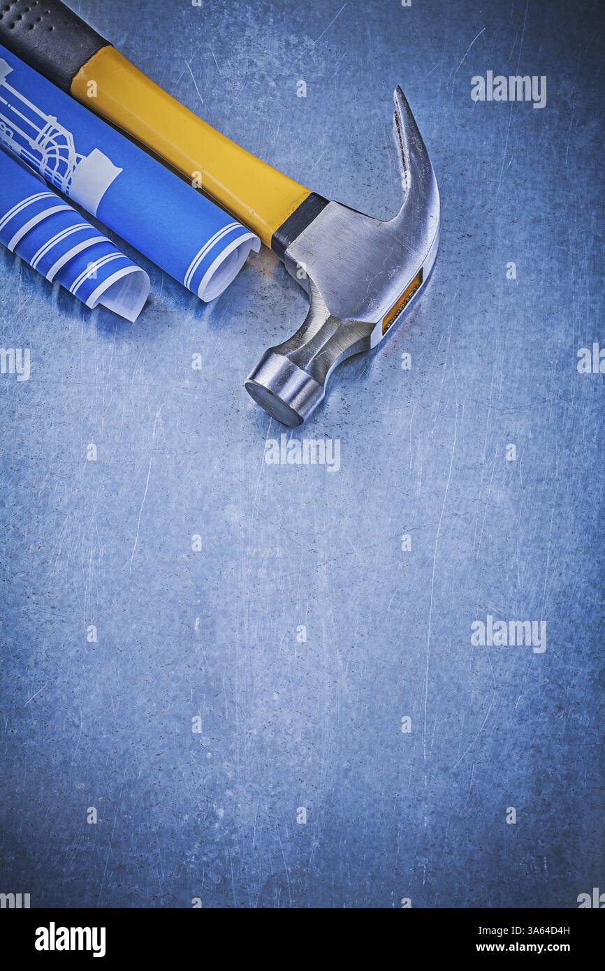 Blue engineering drawings claw hammer on metallic background ...