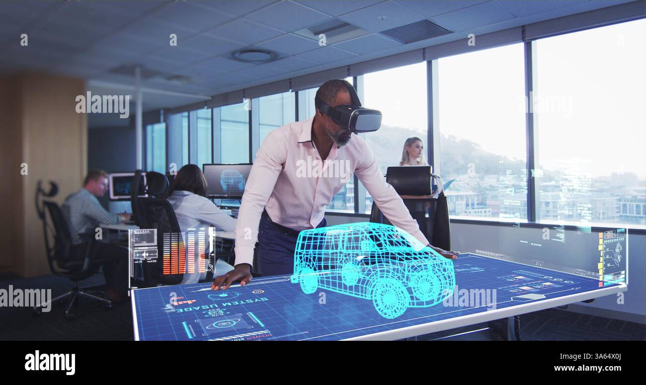 In modern office, man using VR headset interacting with 3D car model on screen Stock Photo