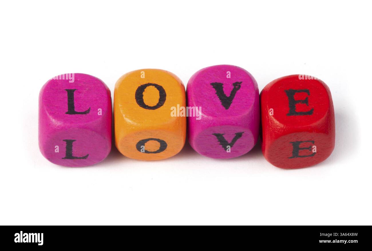 Word love on multicolored wooden cubes white isolated Stock Photo