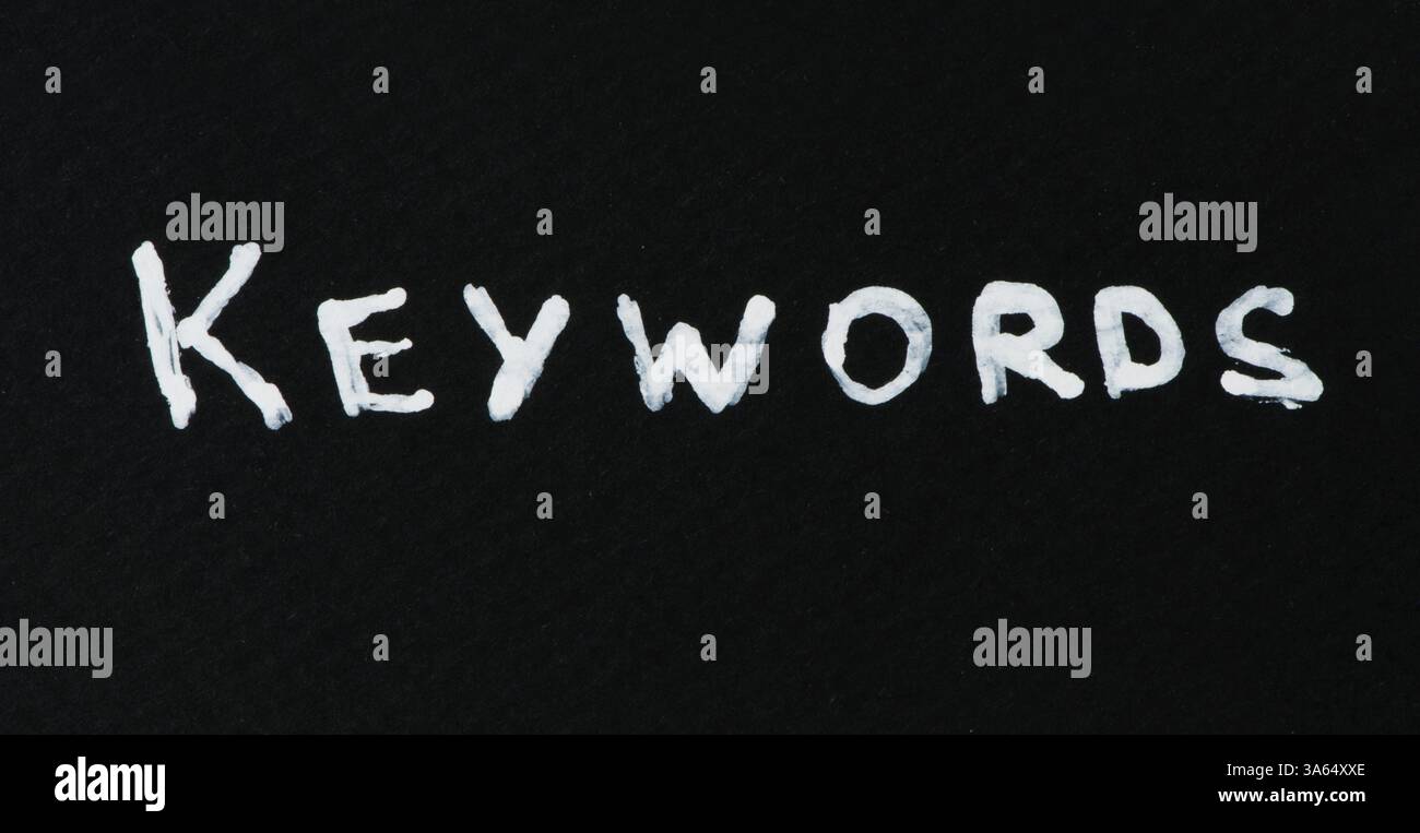 Keywords white text conception over black Stock Photo