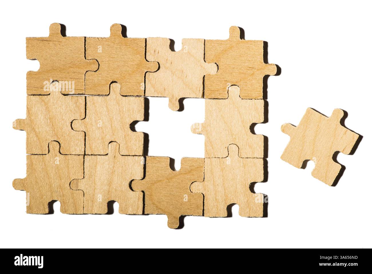 Wooden puzzle on white background. White isolated Stock Photo - Alamy