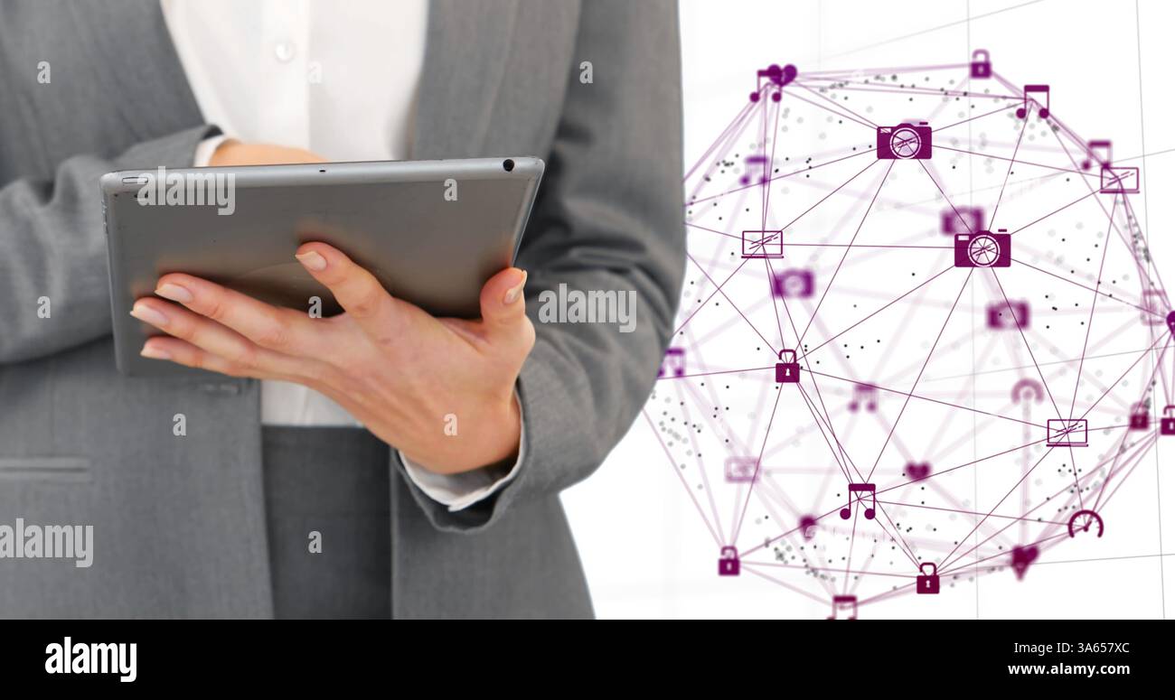 Using tablet, business professional interacting with digital network interface in office Stock Photo